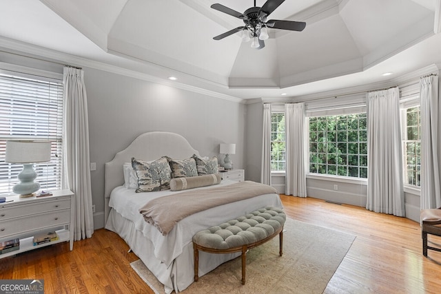 2332 Autumn Maple Dr, Braselton, GA 30517 - bedroom with wood finished floors, a tray ceiling, ceiling fan, recessed lighting, and crown molding
