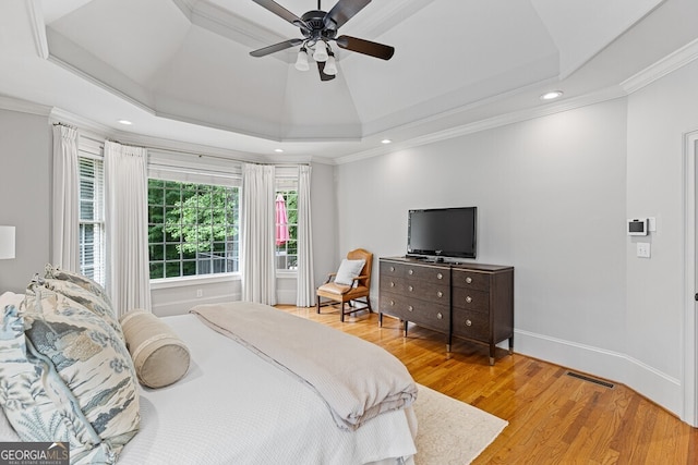 2332 Autumn Maple Dr, Braselton, GA 30517 - bedroom featuring a tray ceiling, light wood-style floors, recessed lighting, ornamental molding, and a ceiling fan
