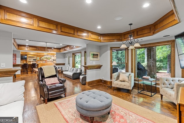 2332 Autumn Maple Dr, Braselton, GA 30517 - living room with plenty of natural light, wood finished floors, a tray ceiling, baseboards, and recessed lighting