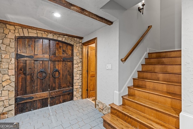 2332 Autumn Maple Dr, Braselton, GA 30517 - entrance foyer featuring stairs and beamed ceiling