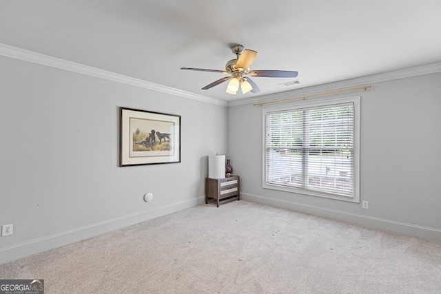 2332 Autumn Maple Dr, Braselton, GA 30517 - spare room featuring ornamental molding, ceiling fan, light colored carpet, and baseboards