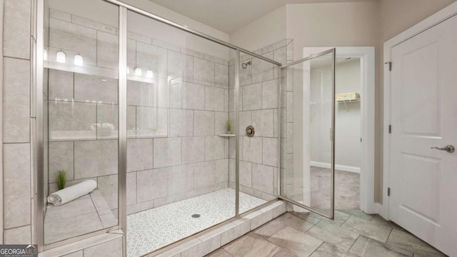 1914 Forte Ln, Alpharetta, GA 30009 - full bathroom featuring a shower stall and a walk in closet