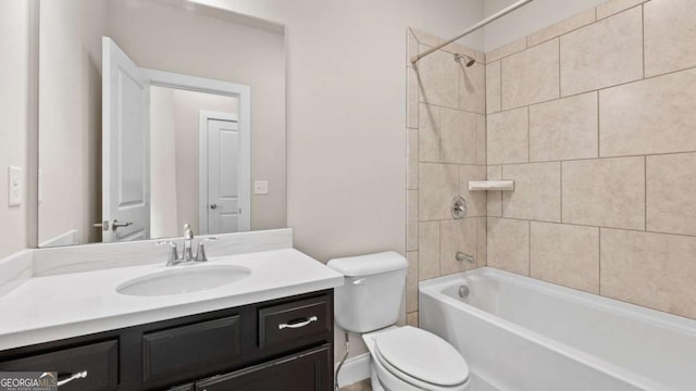 1914 Forte Ln, Alpharetta, GA 30009 - bathroom featuring toilet, vanity, and shower / tub combination