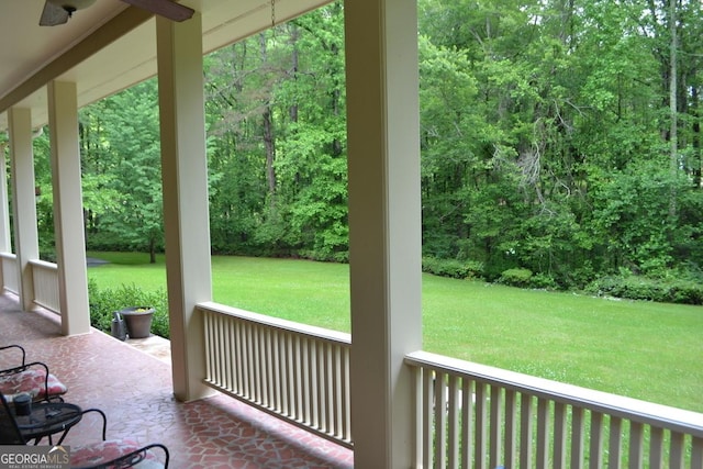 view of patio with a view of trees