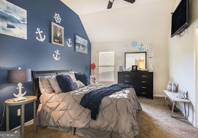 carpeted bedroom with vaulted ceiling, ceiling fan, and baseboards