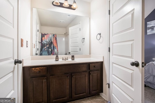 bathroom with vanity and a shower with shower curtain
