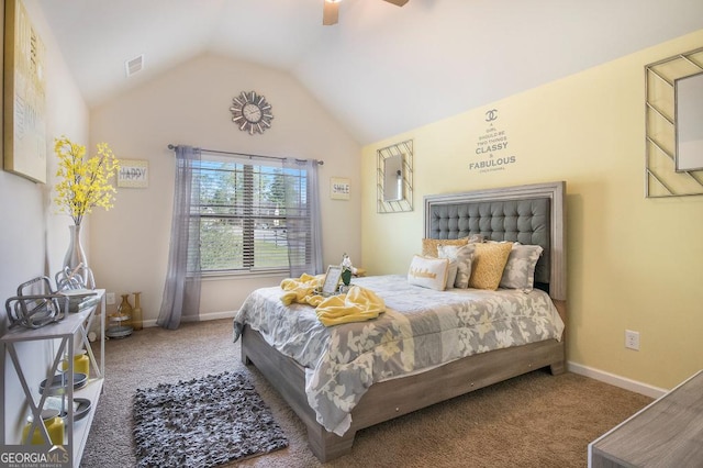 bedroom with carpet, lofted ceiling, baseboards, and ceiling fan