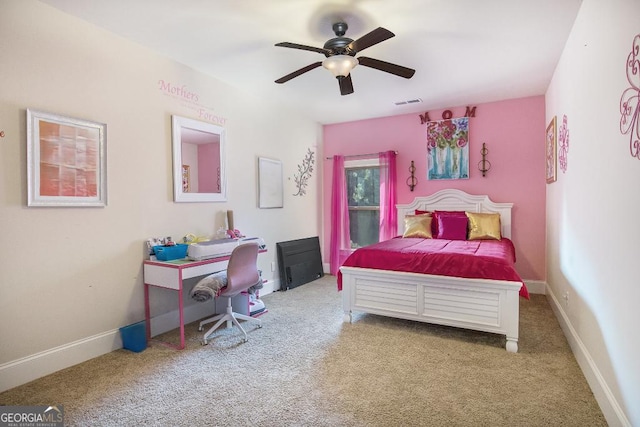 bedroom with carpet floors, ceiling fan, and baseboards
