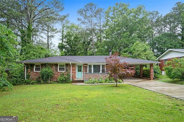 890 Oriole Ln, Marietta, GA 30067 - ranch-style home featuring driveway, a front lawn, a carport, and brick siding