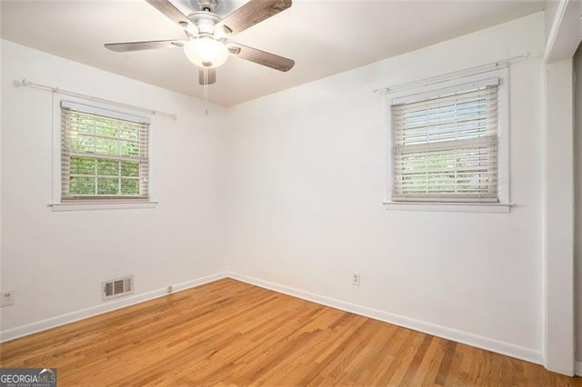 890 Oriole Ln, Marietta, GA 30067 - unfurnished room with baseboards, light wood-style flooring, and ceiling fan
