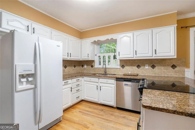 890 Oriole Ln, Marietta, GA 30067 - kitchen with white refrigerator with ice dispenser, dishwasher, a sink, white cabinetry, and crown molding