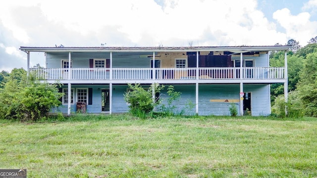 1030 Lee Wilson Rd, Lafayette, GA 30728 - back of house featuring a lawn and a deck