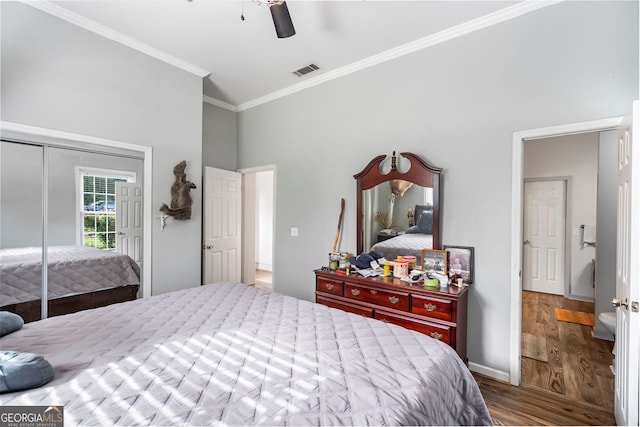 166 Freedom Ln, Commerce, GA 30530 - bedroom with crown molding, wood finished floors, a towering ceiling, ceiling fan, and baseboards