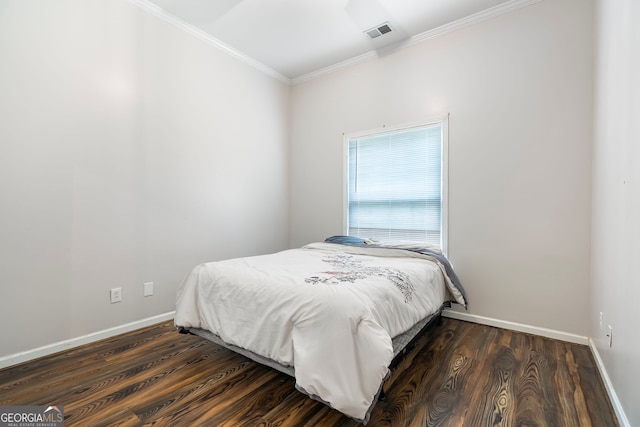 166 Freedom Ln, Commerce, GA 30530 - bedroom with baseboards, crown molding, and dark wood-style flooring
