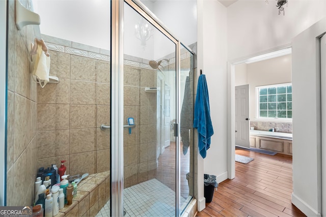 166 Freedom Ln, Commerce, GA 30530 - bathroom with wood finished floors and a stall shower