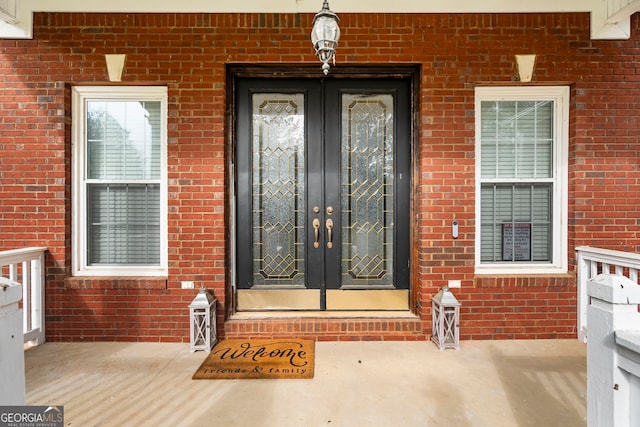 166 Freedom Ln, Commerce, GA 30530 - entrance to property with french doors and brick siding