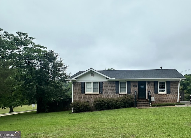 1255 N Mcdonough Rd, Griffin, GA 30223 - view of front facade featuring brick siding and a front yard