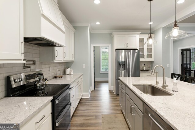 1050 Forrest Highlands, Greensboro, GA 30642 - kitchen featuring stainless steel appliances, custom exhaust hood, a sink, glass insert cabinets, and white cabinetry