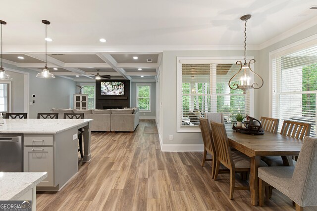 1050 Forrest Highlands, Greensboro, GA 30642 - dining area featuring coffered ceiling, a ceiling fan, ornamental molding, light wood finished floors, and baseboards