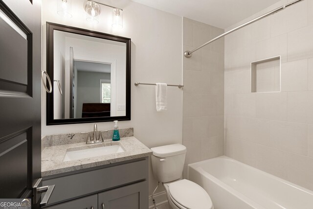 1050 Forrest Highlands, Greensboro, GA 30642 - bathroom with toilet, vanity, and washtub / shower combination