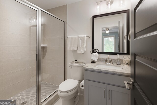 1050 Forrest Highlands, Greensboro, GA 30642 - full bath with a shower stall, toilet, ceiling fan, and vanity
