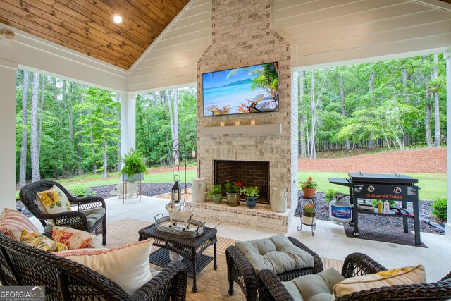 1050 Forrest Highlands, Greensboro, GA 30642 - view of patio / terrace featuring an outdoor living space with a fireplace