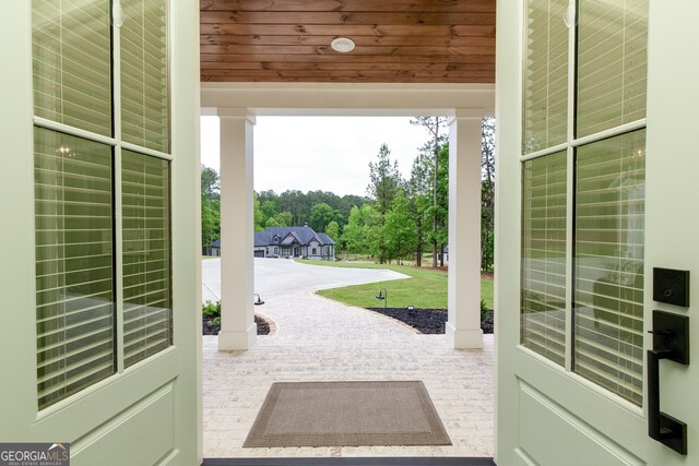1050 Forrest Highlands, Greensboro, GA 30642 - doorway with wood ceiling