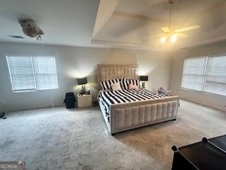 232 Spalding Gates Dr, Atlanta, GA 30328 - bedroom with multiple windows, carpet floors, and ceiling fan