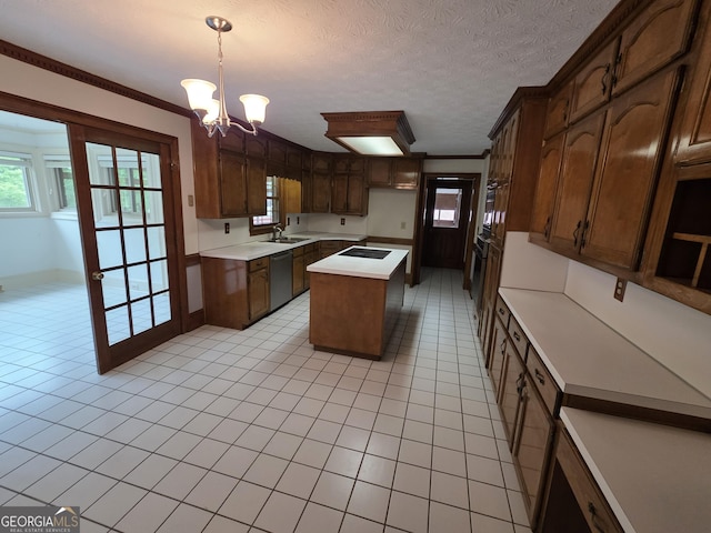 2451 Old Salem Cir SE, Conyers, GA 30013 - kitchen with a sink, a kitchen island, dishwasher, light countertops, and plenty of natural light