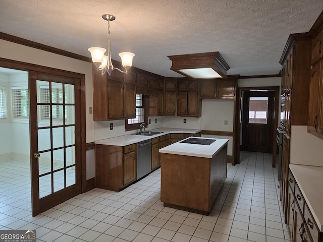 2451 Old Salem Cir SE, Conyers, GA 30013 - kitchen with stainless steel dishwasher, a sink, light tile patterned floors, light countertops, and a chandelier