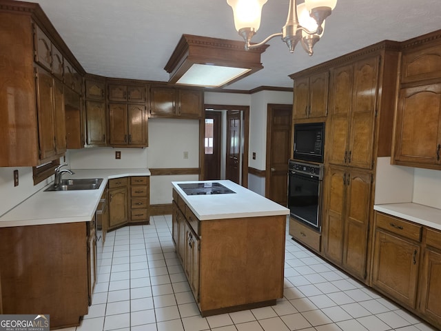 2451 Old Salem Cir SE, Conyers, GA 30013 - kitchen with black appliances, a sink, a kitchen island, light tile patterned floors, and a chandelier
