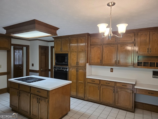 2451 Old Salem Cir SE, Conyers, GA 30013 - kitchen featuring black appliances, light tile patterned floors, a chandelier, hanging light fixtures, and light countertops