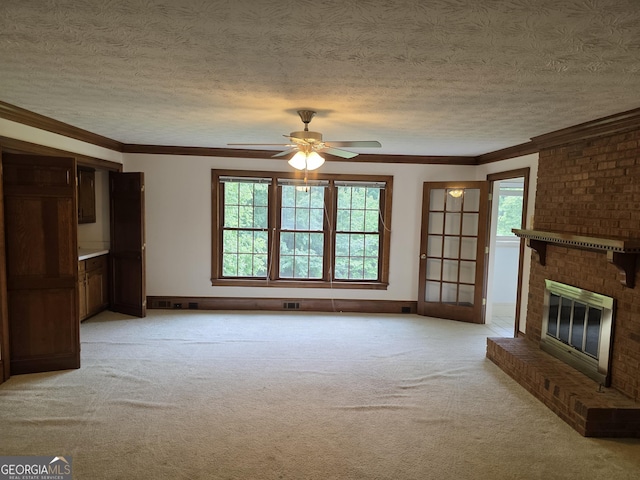 2451 Old Salem Cir SE, Conyers, GA 30013 - unfurnished living room featuring plenty of natural light, a ceiling fan, light carpet, a brick fireplace, and ornamental molding