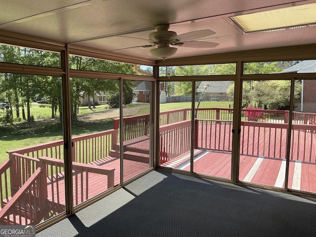 2451 Old Salem Cir SE, Conyers, GA 30013 - unfurnished sunroom with ceiling fan and plenty of natural light