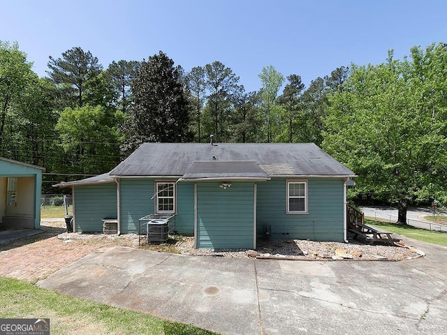 6296 Longino Dr, Union City, GA 30291 - rear view of property featuring cooling unit and a patio