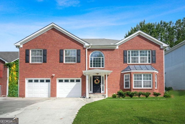 4125 Fallbrook Dr, Duluth, GA 30096 - view of front facade with driveway, an attached garage, a front lawn, and brick siding