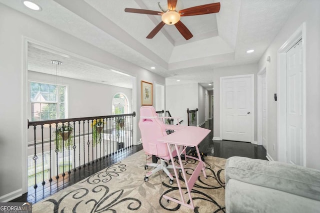 4125 Fallbrook Dr, Duluth, GA 30096 - home office featuring ceiling fan, a tray ceiling, baseboards, and recessed lighting