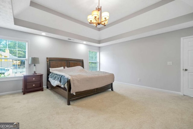 4125 Fallbrook Dr, Duluth, GA 30096 - carpeted bedroom with a chandelier, a tray ceiling, baseboards, and recessed lighting