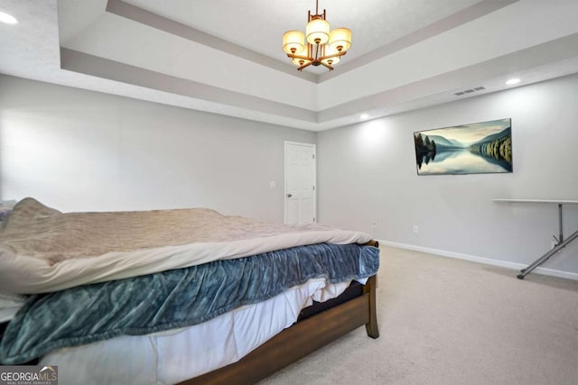 4125 Fallbrook Dr, Duluth, GA 30096 - bedroom featuring baseboards, carpet floors, recessed lighting, a tray ceiling, and a chandelier