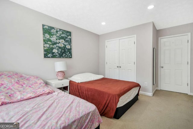 4125 Fallbrook Dr, Duluth, GA 30096 - bedroom featuring light colored carpet, a closet, baseboards, and recessed lighting