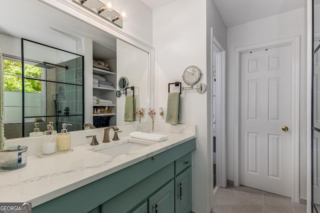 3835 Annandale Ln, Suwanee, GA 30024 - bathroom featuring vanity, tiled shower, and tile patterned flooring