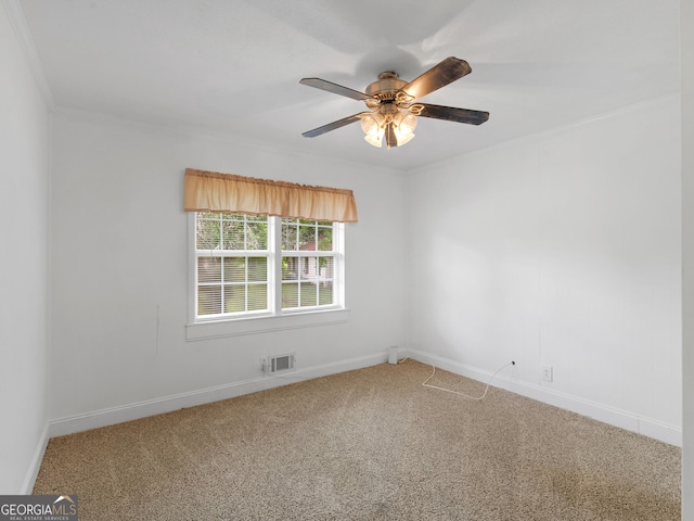 2609 Lake Harbin Rd, Morrow, GA 30260 - carpeted spare room featuring baseboards, a ceiling fan, and crown molding