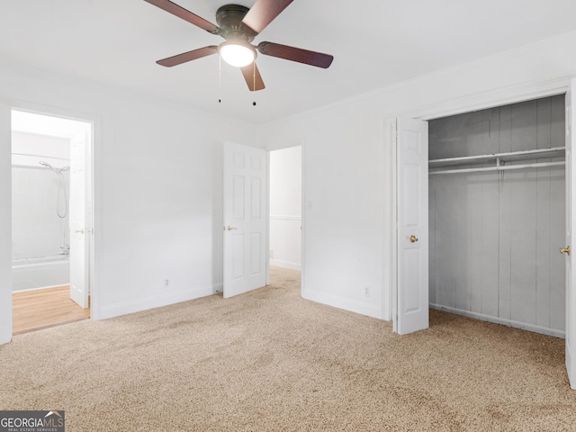 2609 Lake Harbin Rd, Morrow, GA 30260 - unfurnished bedroom with carpet floors, a closet, ensuite bath, and baseboards