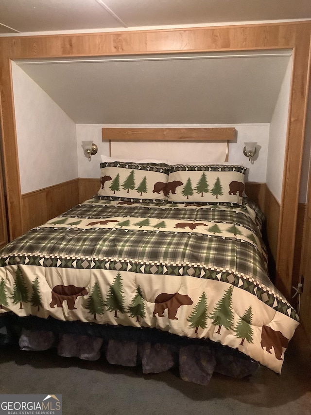 961 Mountain Shadows Dr, Cleveland, GA 30528 - carpeted bedroom with wood walls and a wainscoted wall