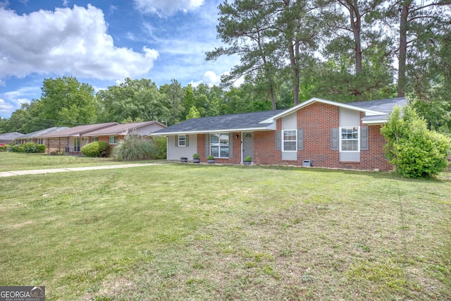 132 Jefferson Dr, Columbus, GA 31907 - ranch-style home with brick siding and a front yard
