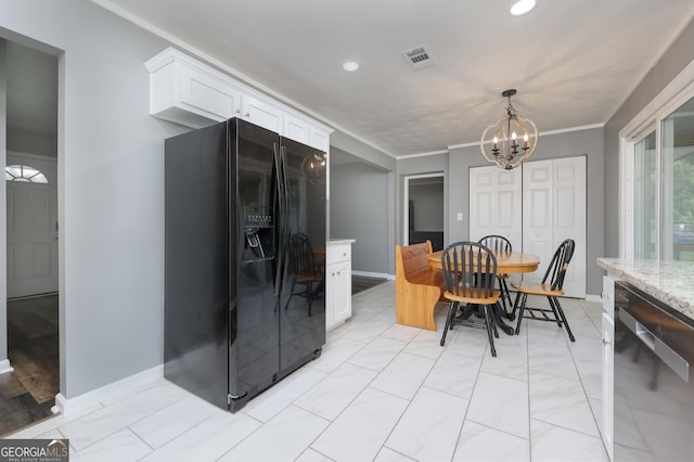 132 Jefferson Dr, Columbus, GA 31907 - dining area featuring a chandelier, recessed lighting, ornamental molding, baseboards, and light marble finish floors