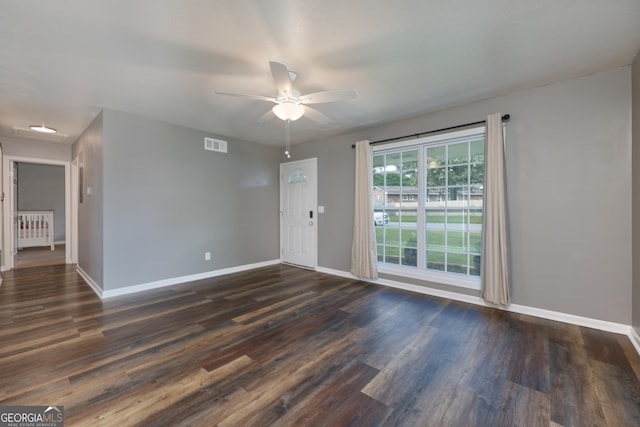 132 Jefferson Dr, Columbus, GA 31907 - unfurnished living room with baseboards, ceiling fan, and dark wood-style floors
