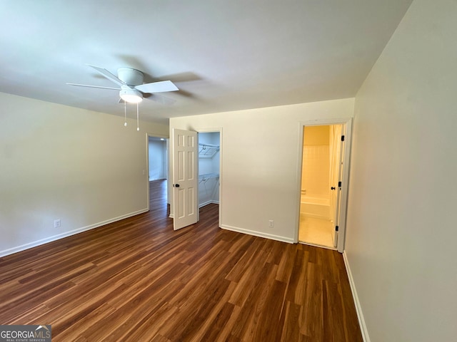 3340 Zingara Rd, Conyers, GA 30012 - unfurnished room featuring a ceiling fan, baseboards, and dark wood-style floors