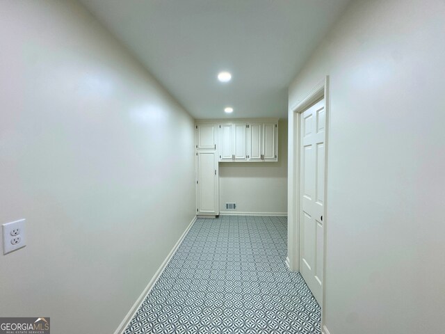 3340 Zingara Rd, Conyers, GA 30012 - washroom with baseboards, recessed lighting, and light tile patterned floors