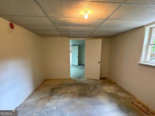 3340 Zingara Rd, Conyers, GA 30012 - basement featuring a paneled ceiling and concrete block wall